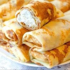 Рецепти:   Смачні ніжні налисники із сиром, запечені у духовці