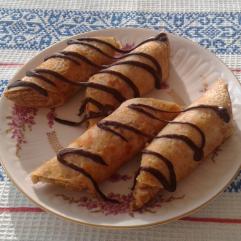 Рецепти:   Смачні апетитні  домашні млинці з шоколадною підливою