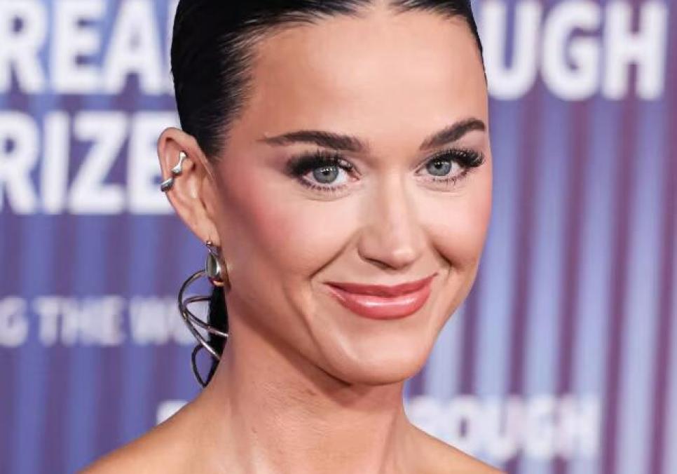 Кеті Перрі змінила імідж заради Джастіна Трюдо на Всесвітньому економічному форумі