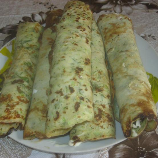 Рецепти:   Смачні домашні кабачкові млинці  з апетитною начинкою